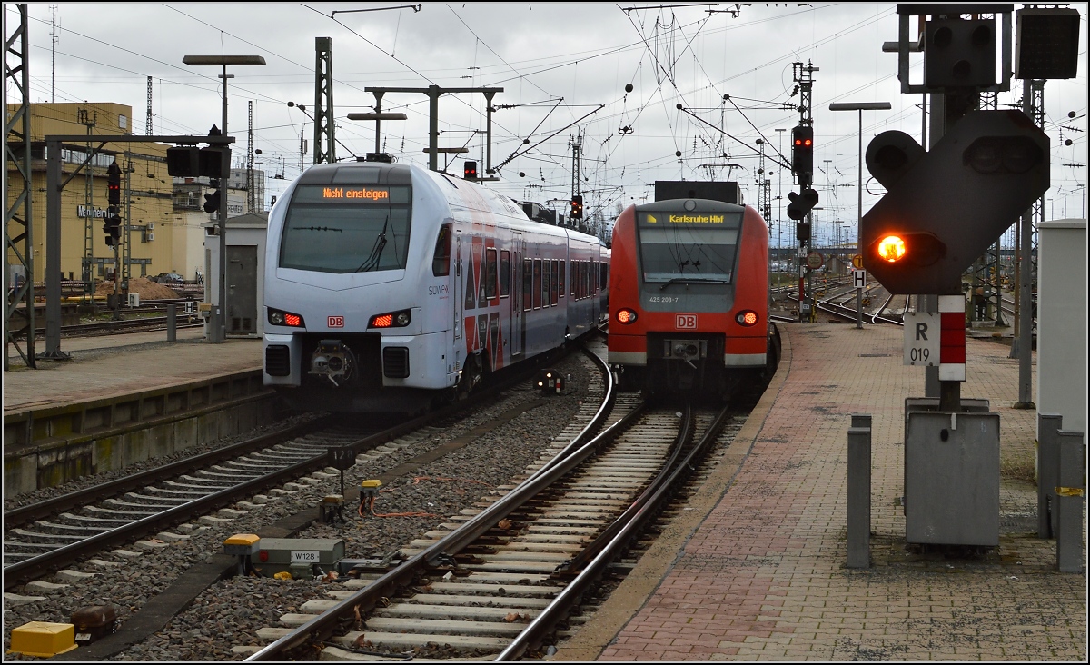 Die Farbe des neuen S�dwest-Express BR 429 wird durch das fahle Licht des aufziehenden Sturms in ihrem Eindruck verst�rkt. Mannheim, Januar 2015.