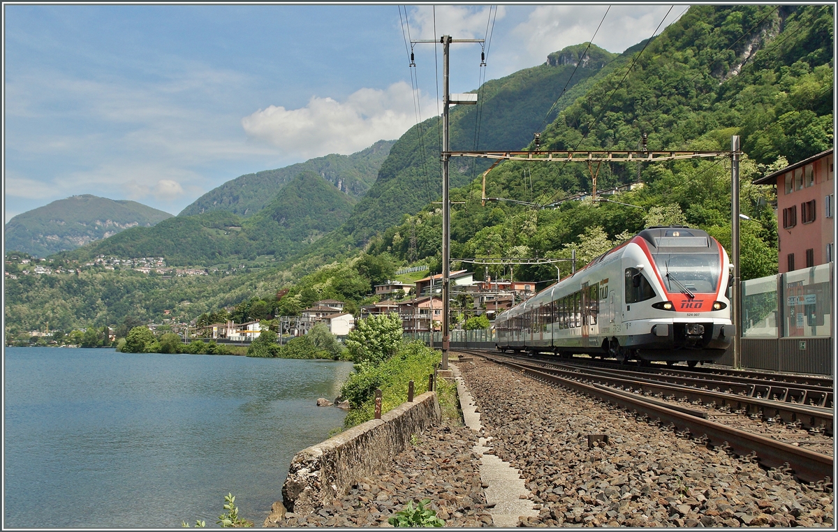Ein TILO Flirt erreicht Capolago Riva San Vitale. 
5. Mai 2014