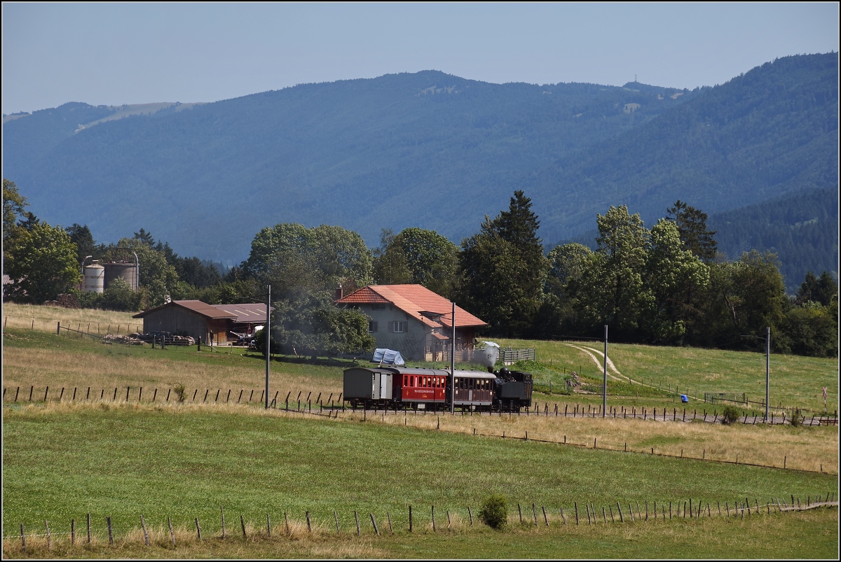 Mit der E 206 nach Tavannes. La Traction Sonderzug bei Pâturage de Sagnes. August 2019.