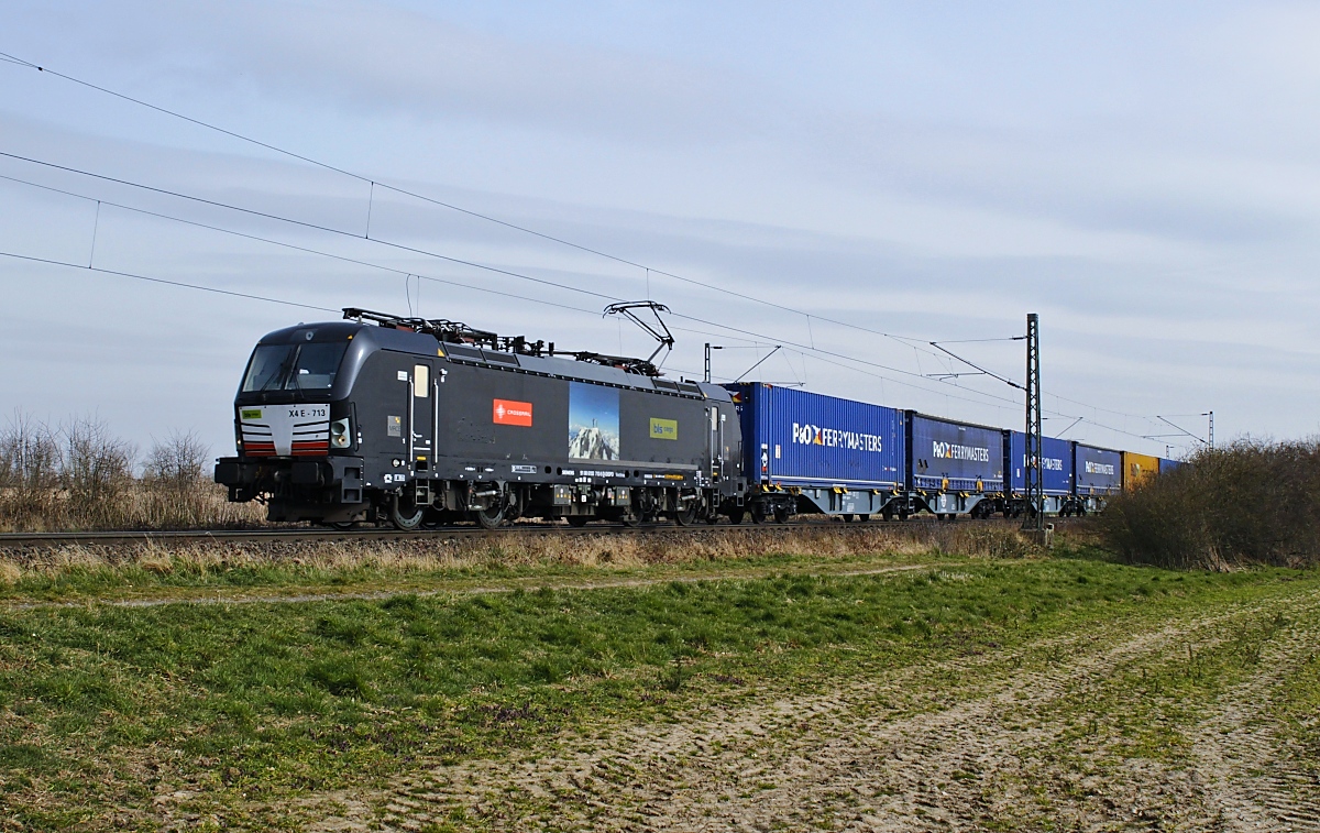 Schweizer Loks tief im Westen: Die an BLS Cargo vermietete 193 713-6 ist am 16.03.2022 bei Boisheim unterwegs in Richtung Niederlande