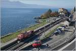 Die etwas bleiche SBB Infra Am 843 003-5 bei der Durchfahrt in Rivaz.