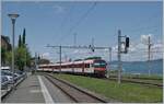 Mit dem schiebenden RBDe 560 403 (RBDe 560 DO RA 94 85 7 560 403-8 CH-RA) erreicht als R 91 auf der Fahrt von St-Gingolph nach Brig den Bahnhof von Bouveret. 

24. Juli 2024