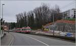Bei Oberdorf ist ein Waldenburger Zug auf dem Weg von Liestal nach Waldenburg und rechts im Bild sind die aufw�ndigen Bauarbeiten f�r die Meterspurstrecke gut zu sehen. 

21. M�rz 2021