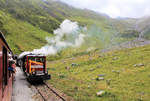 Dampfbahn Furka Bergstrecke: In Richtung Muttbach-Belvédère - Furka werden die Dampfzüge mit einer Schiebelok versehen, die Tm 506, die von der CJ stammt.